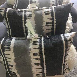 At Home throw pillows.